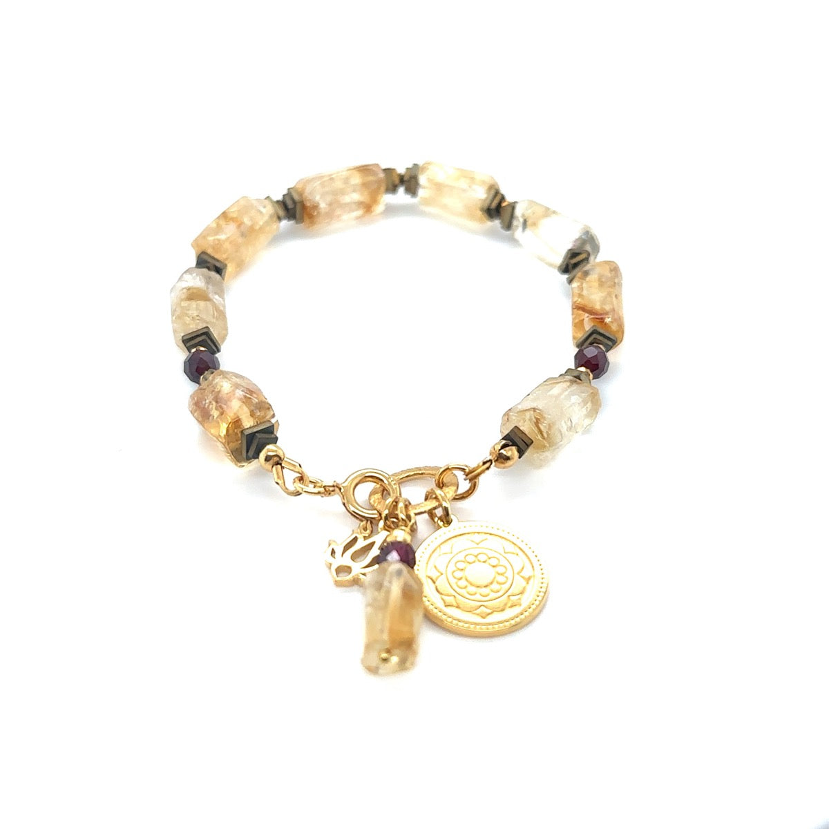 Bransoletka Empire of The Sun z cytrynem od Ewa Mrochen Jewellery na dłoni, delikatna i elegancka biżuteria.