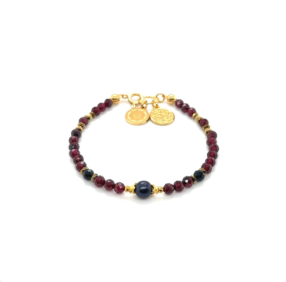 Bransoletka z granatem Odwaga i Moc od Ewa Mrochen Jewellery, elegancki dodatek z kamieniami i metalowym zapięciem