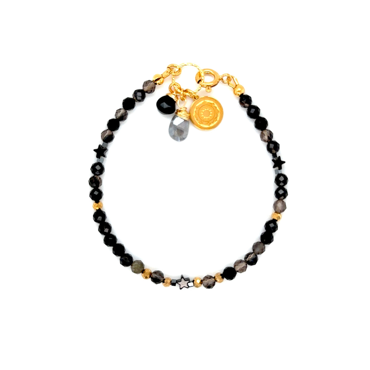 Bransoletka obsydianowa STARLIGHT od Ewa Mrochen Jewellery, delikatna z czarnymi kamieniami, na srebrnym łańcuszku, długość 15 cm.