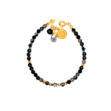 Obsydianowa bransoletka zapinana od Ewa Mrochen Jewellery, elegancki dodatek z naturalnym kamieniem na nadgarstek.