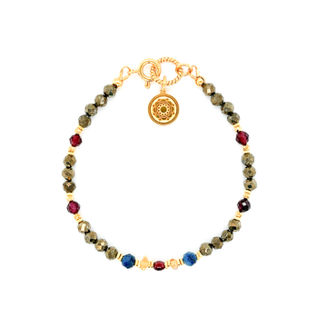Bransoletka Ewa Mrochen Jewellery z piryt, kyanit, cytryn i granat, ozdobiona naturalnymi kamieniami, na delikatnej sznurze.