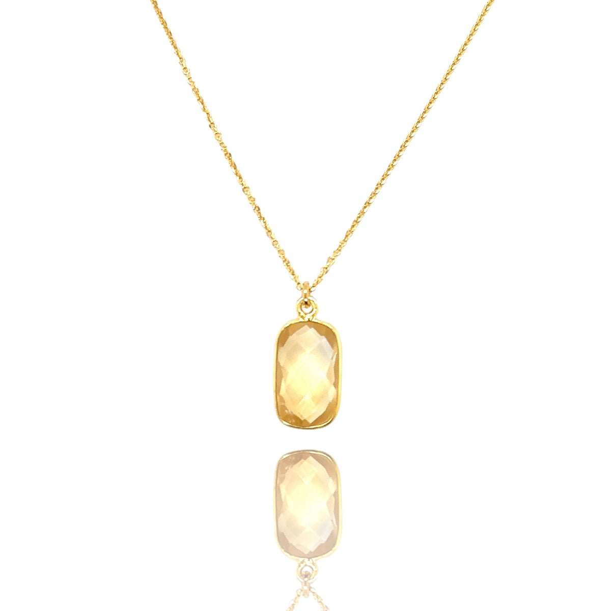 Naszyjnik z cytrynem Sun of the Heart od Ewa Mrochen Jewellery, złoty łańcuszek z żółtym kamieniem w centralnym ogniu.