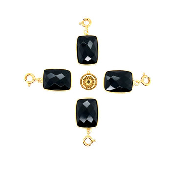 Czarna zawieszka z turmalinem od Ewa Mrochen Jewellery, elegancki wisior z czarnym kamieniem na tle białego tła