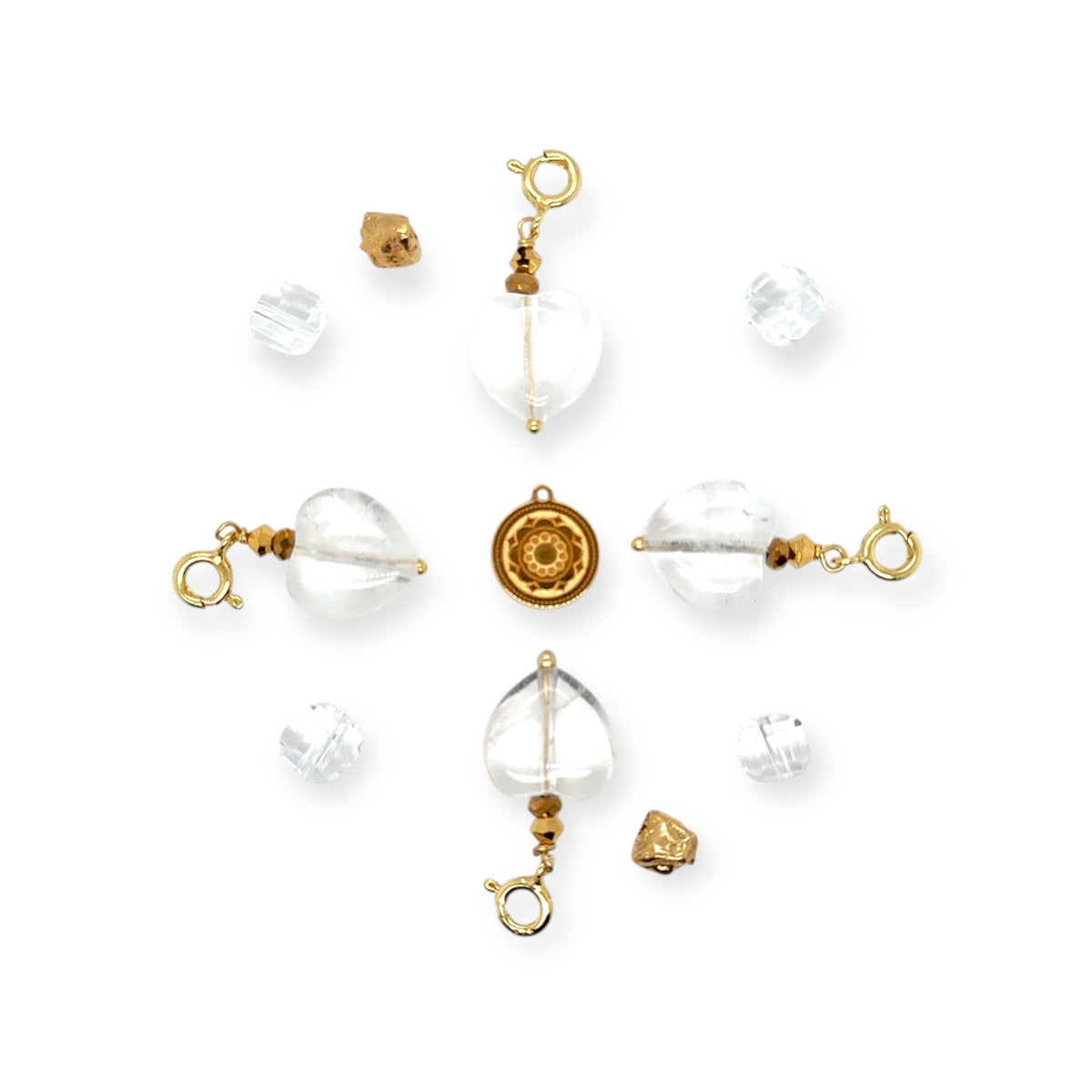 Zawieszka w kształcie serca z kryształem górskim od Ewa Mrochen Jewellery® na tle jasnego tła.