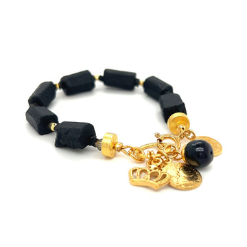 Czarna bransoletka z turmalinem i diamentami od Ewa Mrochen Jewellery, elegancki dodatek na nadgarstek