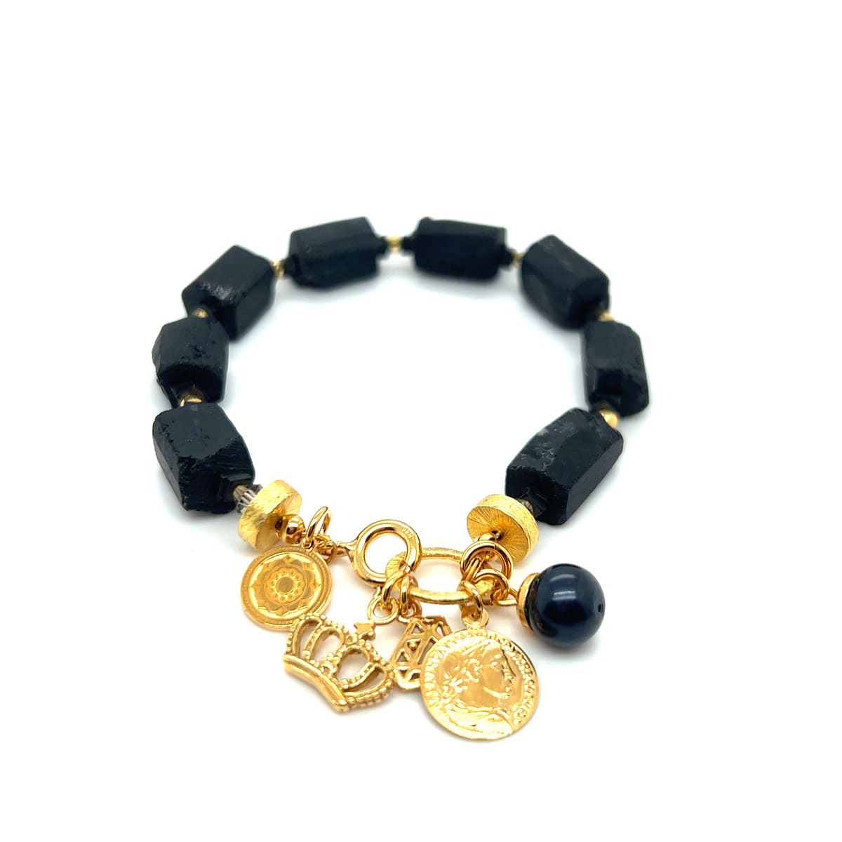 Czarna bransoletka z turmalinem i diamentami od Ewa Mrochen Jewellery, elegancki dodatek na nadgarstek.