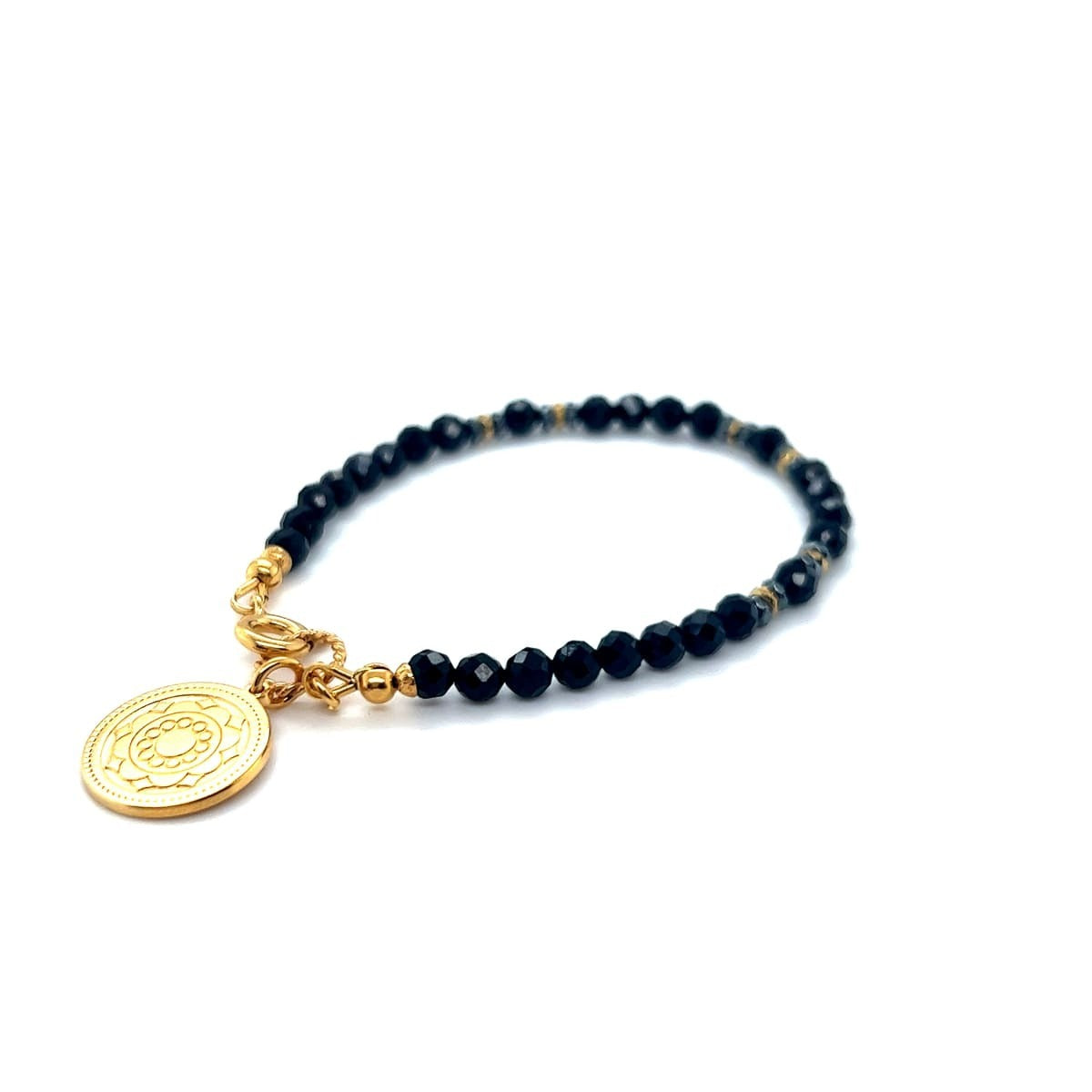 Czarna bransoletka z turmalinem od Ewa Mrochen Jewellery, ochrona i pozytywna transformacja, delikatna i elegancka ozdoba na nadgarstek