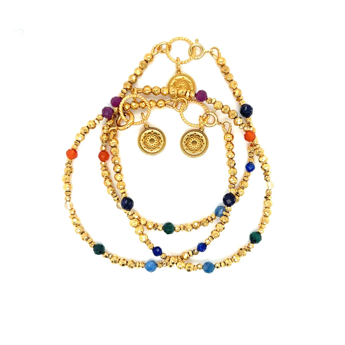 Bransoletka Harmonia Czakr Ewa Mrochen Jewellery na nadgarstku z czakrami i naturalnymi kamieniami.