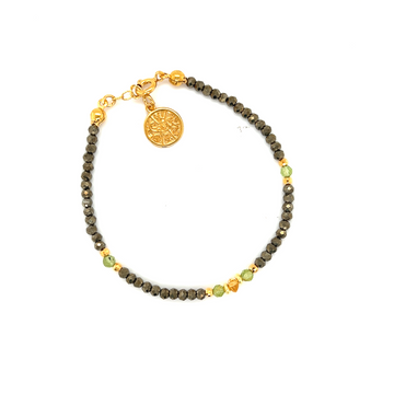 Bransoletka Ewa Mrochen Jewellery z cyrkoniami, oliwinem i pirytami, ozdobiona kamieniami na delikatnym łańcuszku.