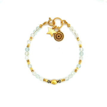 Bransoletka Topaz Błękitny Magia Łagodności od Ewa Mrochen Jewellery, z niebieskim topazem i eleganckim designem.