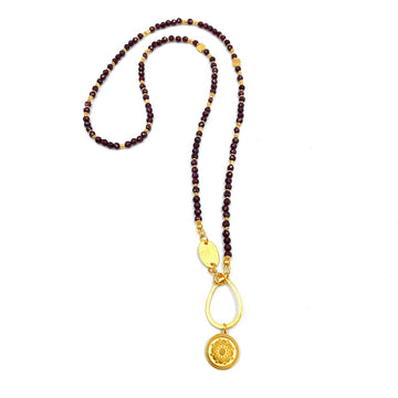 Naszyjnik z granatem Feniksa od Ewa Mrochen Jewellery, elegancki biżuteria z kamieniem szlachetnym, ozdobny element w kształcie feniksa