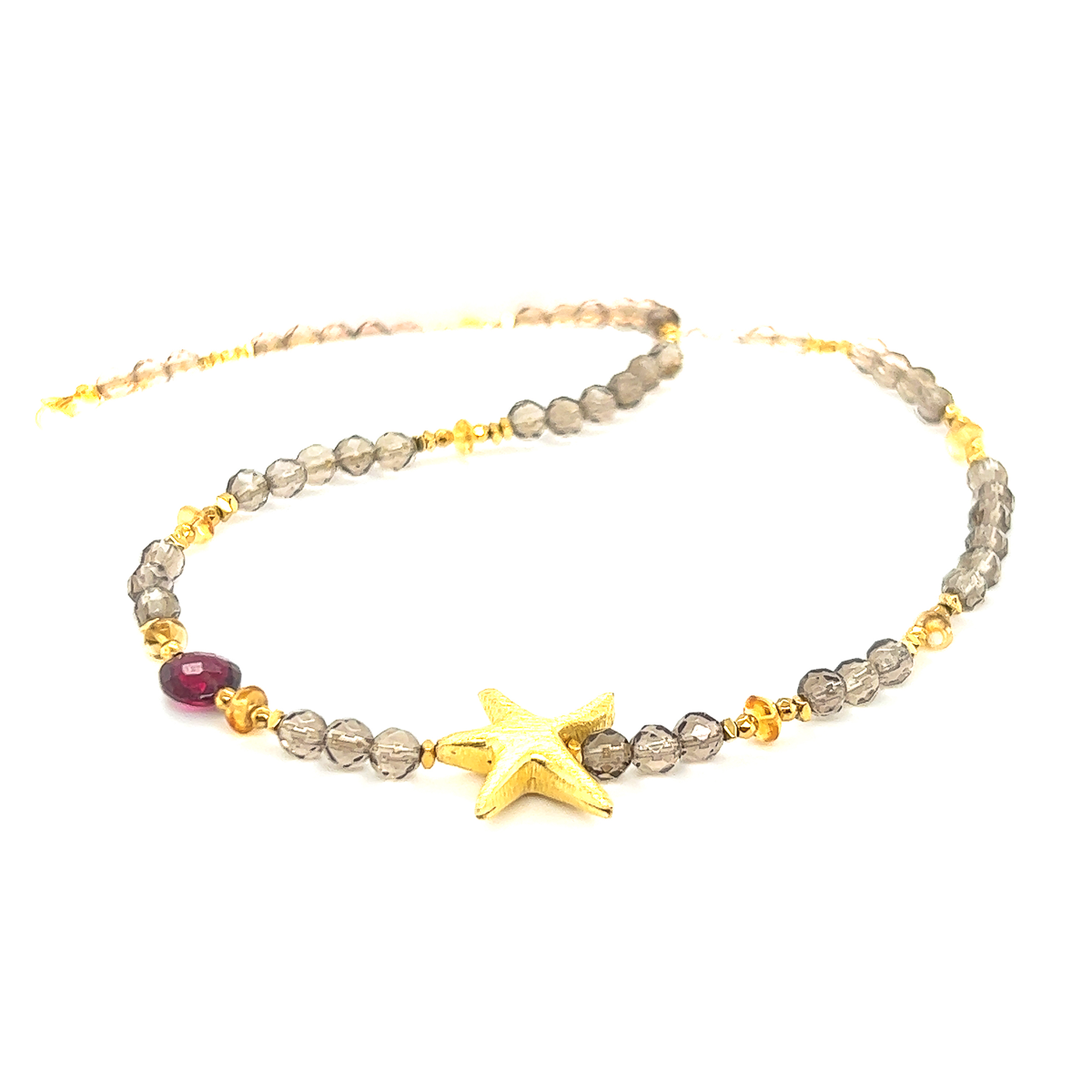 Naszyjnik z kwarcu dymnego od Ewa Mrochen Jewellery, klejnot wsparcia na łańcuszku złotym lub srebrnym.